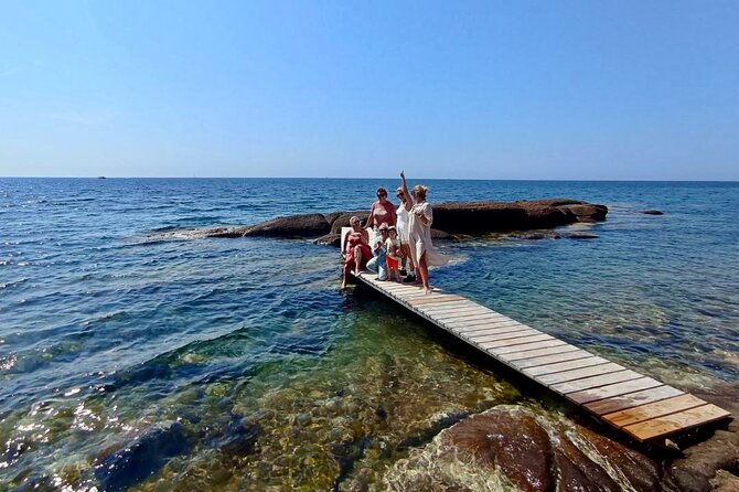 French Riviera Colorado & Var West by Train (from Cannes/Nice) - Plage du Débarquement starts the day with red rock and wartime history